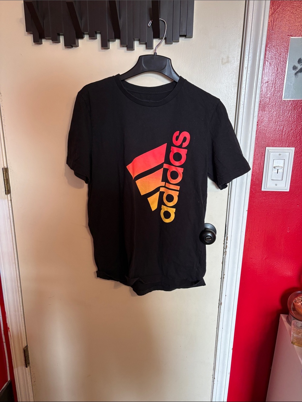 adidas Black Short-Sleeve Tee with Red-Orange-Yellow Gradient Logo